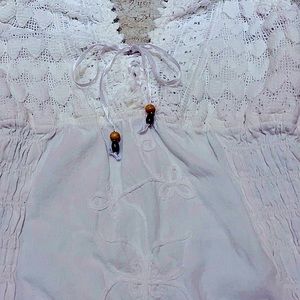 Gorgeous NWT white Peruvian cotton romper with halter tie